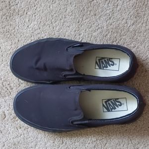 Vans black slip ons